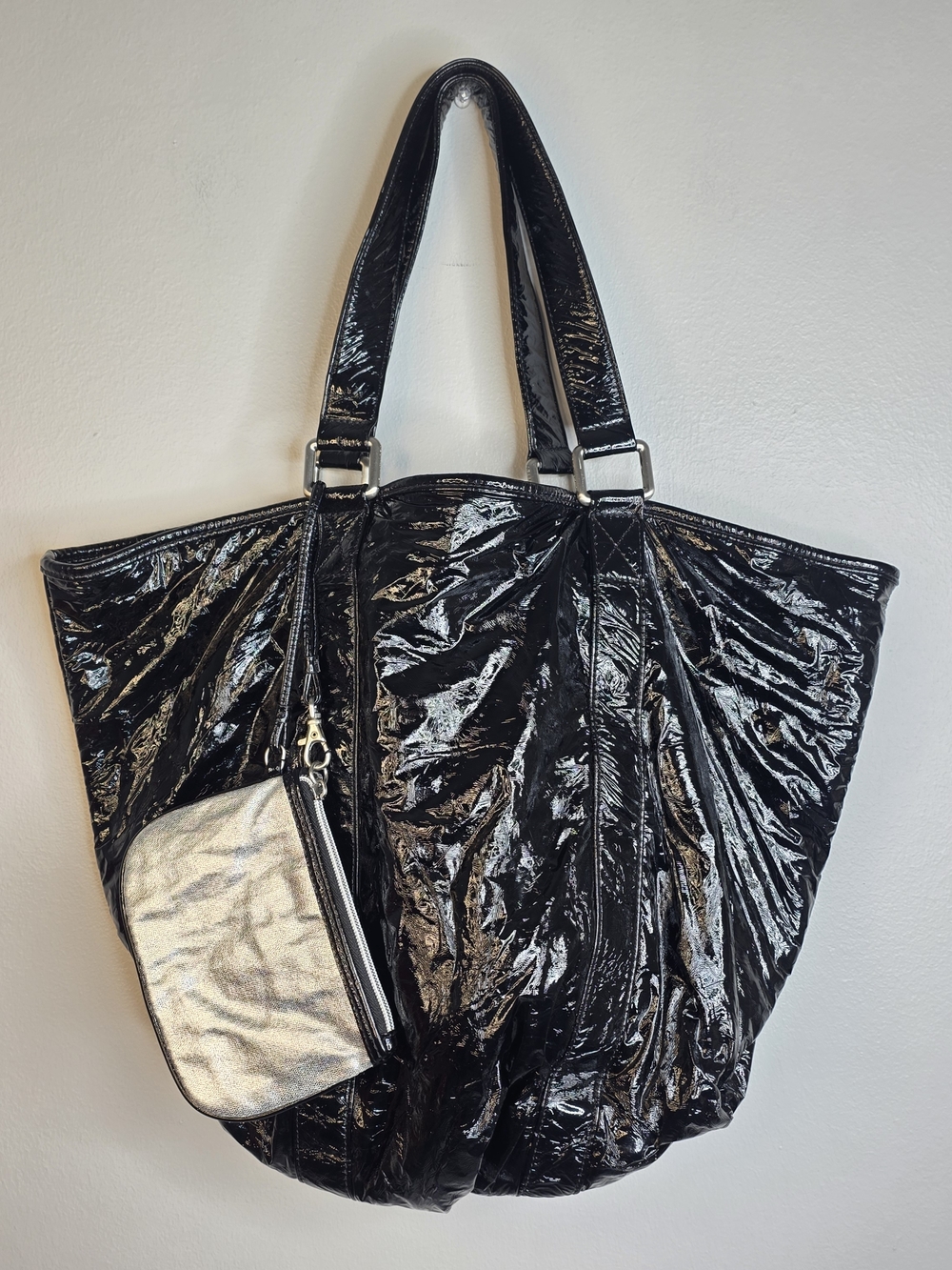 The limited Large Black Crinkle Tote with Silver Lining & Matching Pouch.